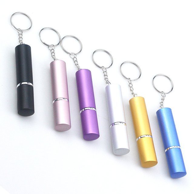 Multifunksionele draagbare mini 5ml parfuum of peper spaarbottel sleutelhanger